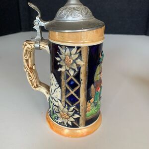 Vintage Reinhold Merkelbach Lidded German Beer Stein Mug Pair on a Log #3393.